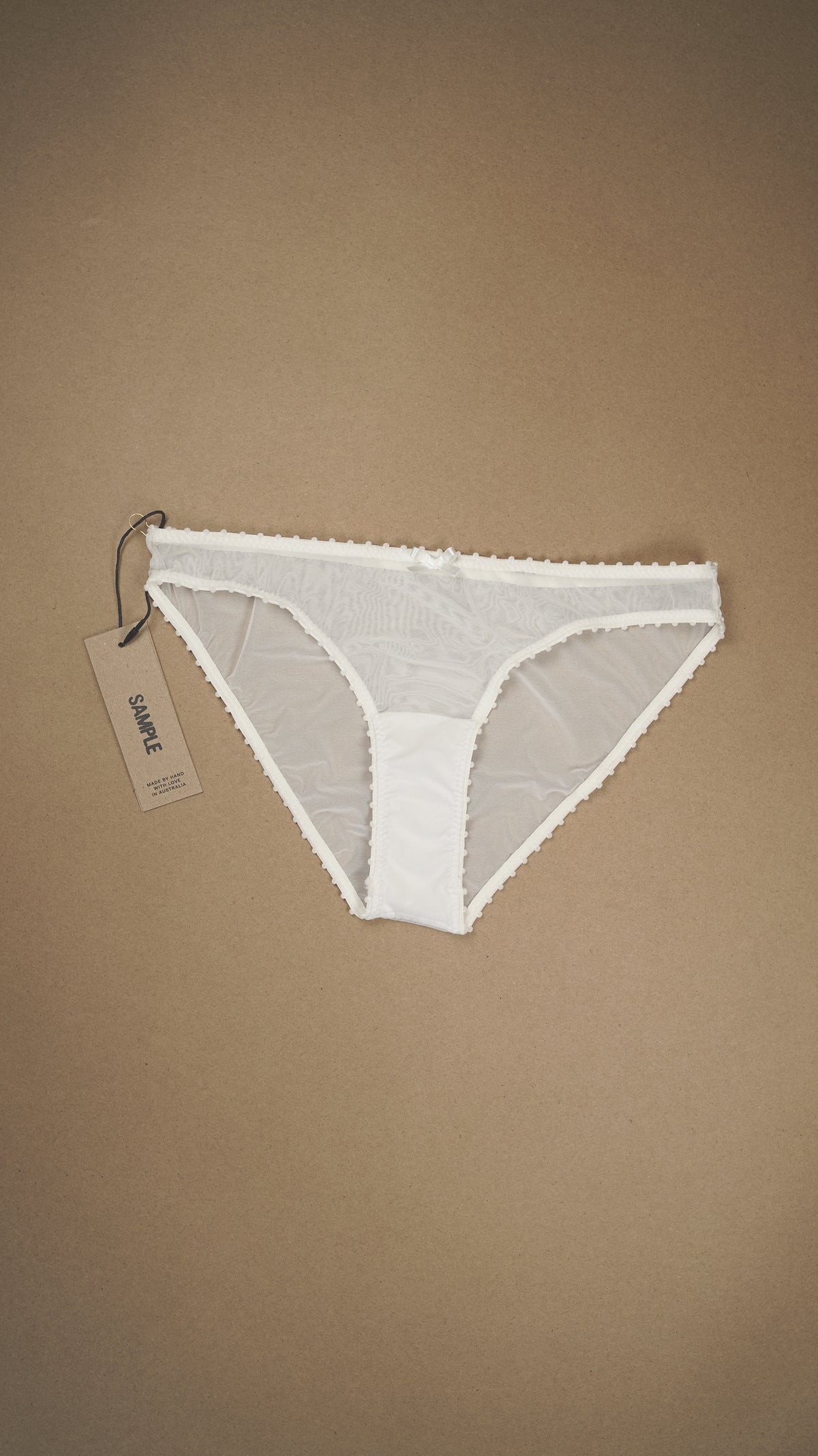 SAMPLE: Pom Pom Trim Bikini Brief Size XS