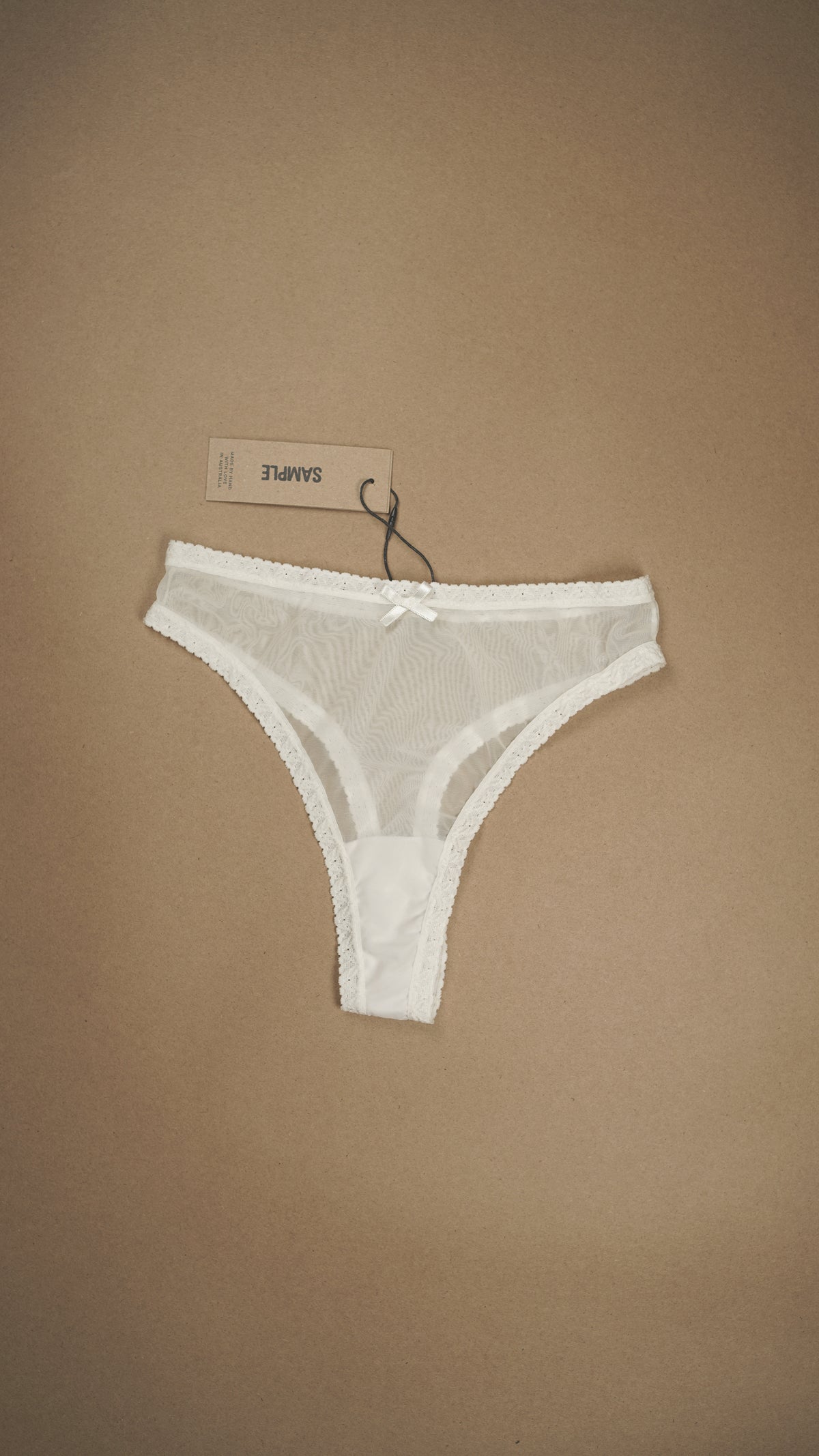 SAMPLE: Lace Trim Thong Size XS
