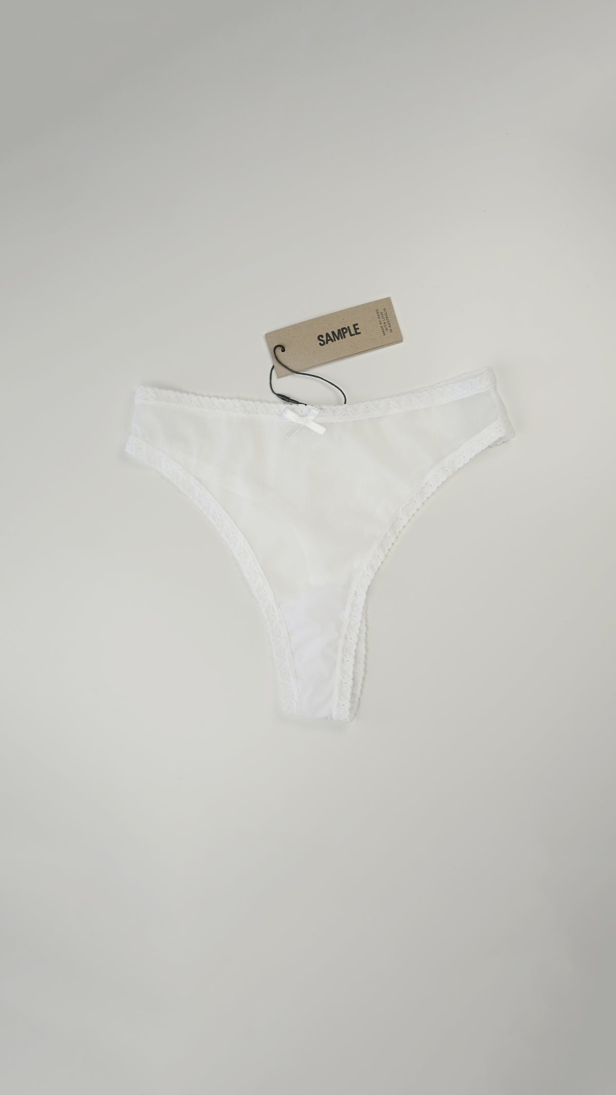 SAMPLE: Lace Trim Thong XS